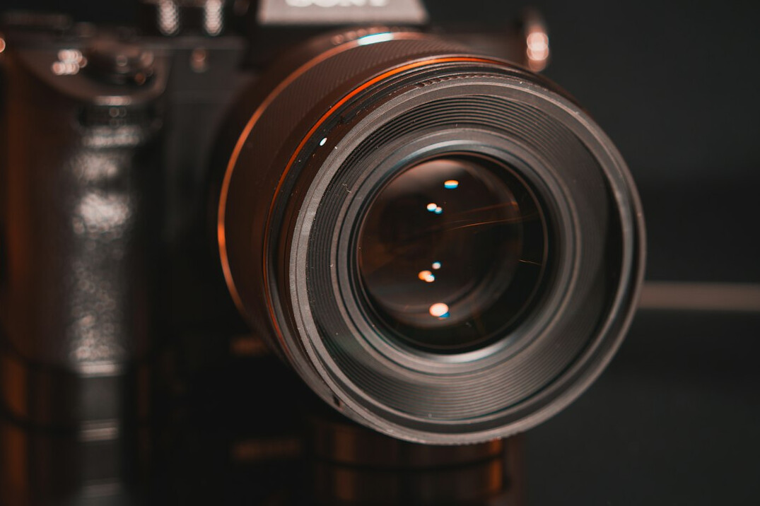 Close-up of a camera lens on a professional camera